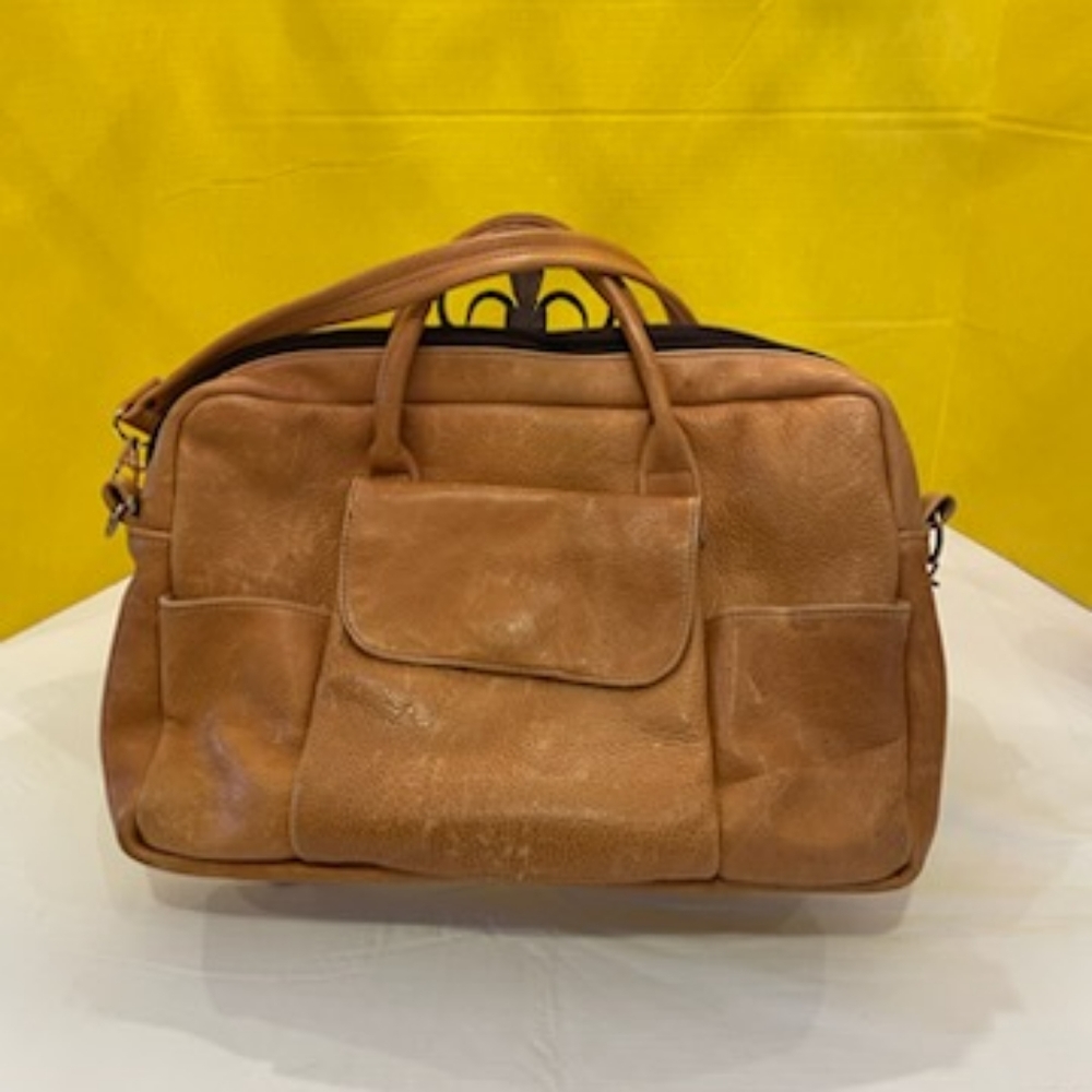 Brown / tan leather crossbody messenger bag.